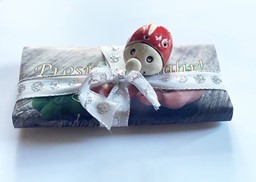 Bild von Prosit Neujahr Schokolade mit Glücksbringer - Ganze Kürbiskerne in Weißer Schokolade